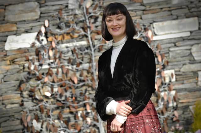 Bronagh Gallagher is a singer and actor born and raised in Derry. Her big break came when she starred as Bernie in The Commitments in 1991, which was followed up with small parts in Pulp Fiction (1994) and Star Wars: Episode I – The Phantom Menace (1999). Gallagher starred in Bump Along the Way, a Derry-made film about a woman who becomes pregnant after a one night stand. Bronagh Gallagher also had a cameo in Derry Girls where she played a singer in a band called The Commitment at Jenny Joyce's house party. Gallagher released her most recent EP WITCH IT UP in June last year. Bronagh Gallagher is pictured at the Foyle Hospice Memory Tree. (DER1014PG074)