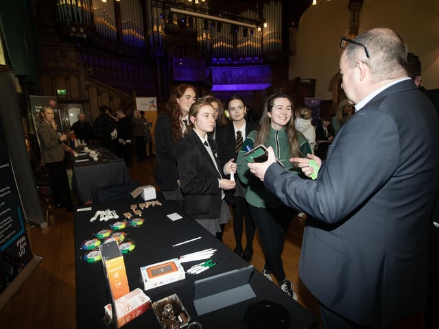 Students receiving information from one of the many stalls at Thursday's Apprenticeship Fair in the Guildhall, Derry.