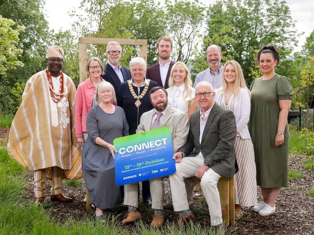 Image 3: Gathered at Black Mointain Shared Space  Pictured L-R is Jahswill Emmanuel, Denise Hayward, Volunteer Now, Jacqueline Irwin, Community Relations Council, Peter Day, Community Relations Council, Cllr Alison Bennington, NILGA, James Martin MBE, Chris Gardner, Director of Good Relations and T:BUC Division, Steph O’Rourke, Springboard Opportunities, Martin McDonald, Community Relations Council, Neil Lynas, TEO, Amy Gribbon, Antrim and Newtownabbey Council,  Alison Mealey,TEO