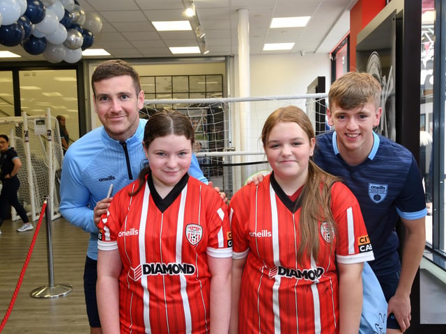 Derry City stars Patrick McEleney and Ciaron Harkin pictured with young fans who enjoyed meeting them at the O'Neills Superstore on Tuesday.