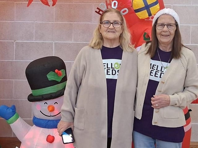 DEEDS volunteers Ann Lynch and Jean McCauley pictured at the Christmas Concert in the Bishop's Field Centre, Creggan.