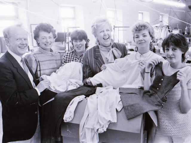 YTP Clothing trainees' gifts to three charities.