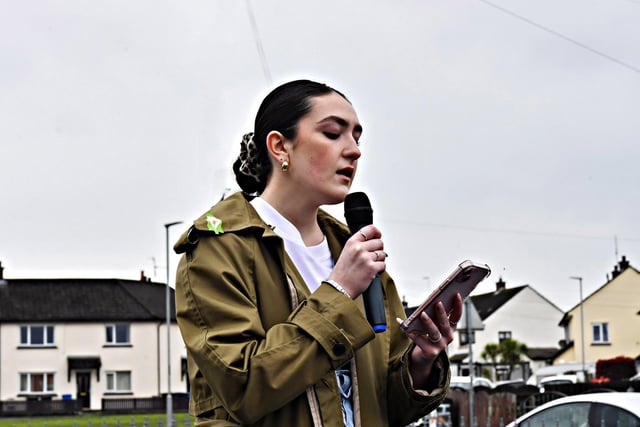 Clara Hutton sings a lament at the Creggan Republican Monument during a commemoration on Easter Sunday afternoon. Photo: George Sweeney