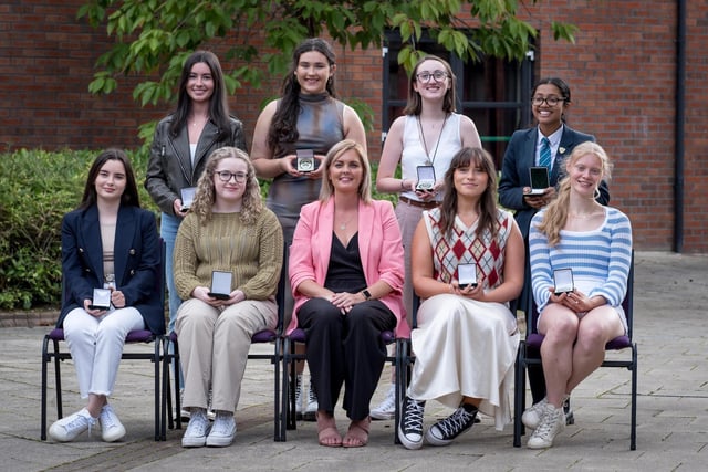 Top Performing Students at A2 Level pictured at Thornhill College's senior prizegiving. 
Front Row: Ella McCrea, Orlaith McCorriston, Ms C. Barr (Head of Year), Sadie Sturgeon, Sophie Parlour, 
Back Row: Caitlin Coyle-Deeney, Roise O'Murchu, Hannah Quigley, Benita Biju (represented by her sister Jovita)