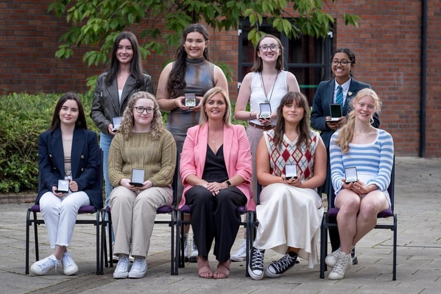 Top Performing Students at A2 Level pictured at Thornhill College's senior prizegiving.
Front Row: Ella McCrea, Orlaith McCorriston, Ms C. Barr (Head of Year), Sadie Sturgeon, Sophie Parlour,
Back Row: Caitlin Coyle-Deeney, Roise O'Murchu, Hannah Quigley, Benita Biju (represented by her sister Jovita)