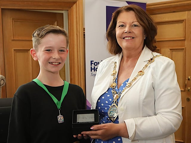 Mayor Patricia Logue presents a gift to Ryan Sheerin, World Champion Irish Dancer. (Photo - Tom Heaney, nwpresspics)