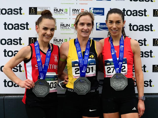 Ann-Marie McGlynn (Strabane AC), 1st lady home, with left, Judith Storm, (City of Derry Spartans AC), 2nd place and Maria McGee, 3rd place in the Bentley Group Walled City 10 Mile race, Ebrington Square on Saturday. (Photo - Tom Heaney, nwpresspics)