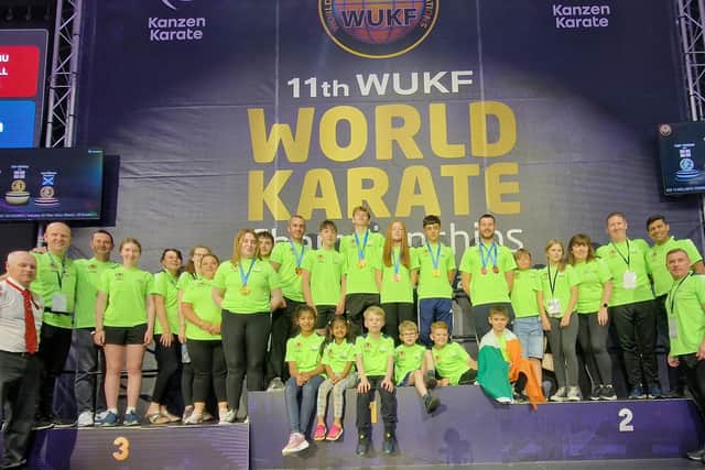 The UKF squad which competed at the 11th WUKF World Karate Championship in Dundee pictured with some family members and (on left) WUKF Referee Sensei Denis Donaghey (Aileach Karate Club)