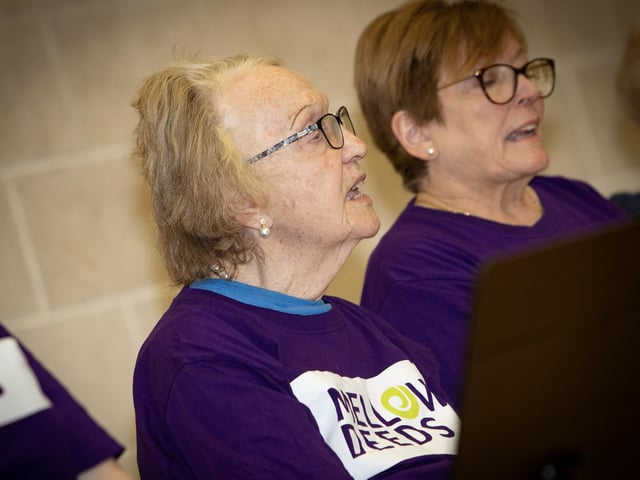 One of the Mellow Deeds choir in full flow on Friday morning.