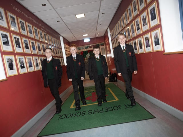 New Year 8 starts at St. Joseph's pictured on Monday morning as they make their way to assembly. From left, Charlie Carlin, Harry Johnston, David McKinney and Conleth McKay. (Photos: Jim McCafferty Photography) : St. Joseph's Boys School welcomes latest influx of Year 8 pupils