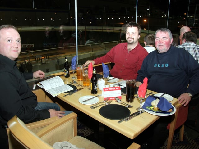 Donal Breslin, John McGovern, Boris Siegel study the form at the Lifford Stadium 0054JML : Parties and nights out in Derry and Donegal in February 2006.