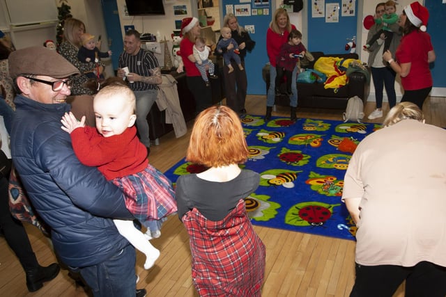 Parents and toddlers ready to get started at Friday’s Christmas event at the community centre in Bishop Street.