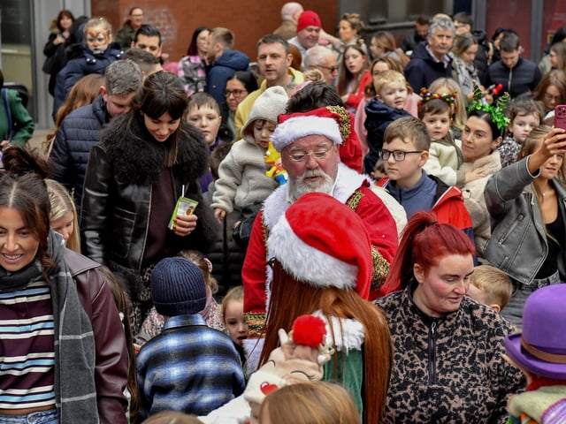 Santa arrives at the Richmond Shopping Centre on Sunday afternoon. Photo: George Sweeney