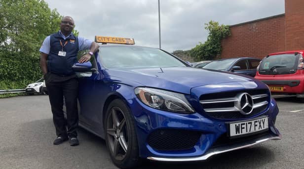 Obinna Okeagu, better known locally as Austin, who is from Nigeria. Obinna has been a taxi driver in Derry for four years and is thought to be the city’s first black African cabbie.