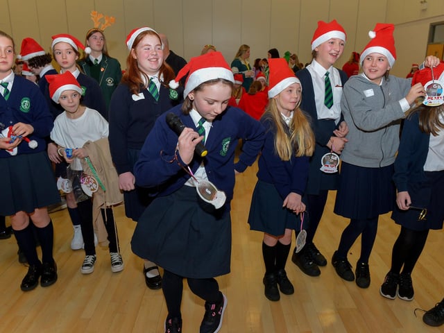 Pupils from St Patrick’s Primary School pictured singing carols at the St Cecilia’s College Christmas Workshop on Friday morning. Photo: George Sweeney. DER2248GS – 90