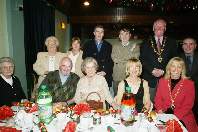 Mayor of Derry, Colr. Shaun Gallagher and mayoress Majella pictured with guests at the SVDP Christmas party which was held at St. mary's Community Centre in Creggan. (0512JB78):.