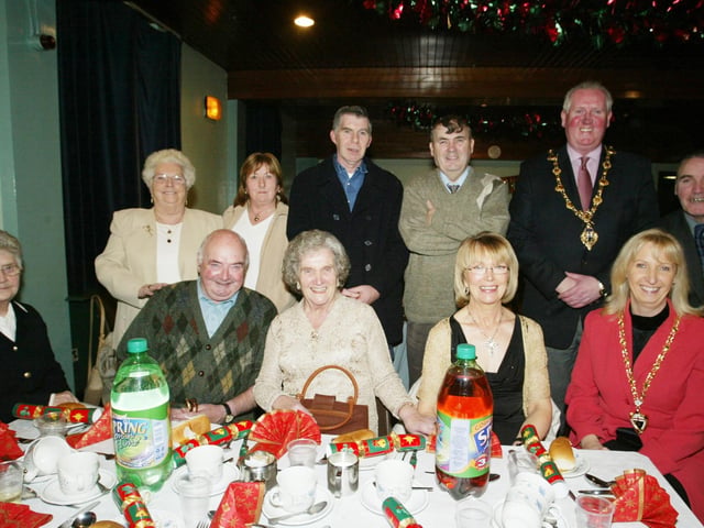 Mayor of Derry, Colr. Shaun Gallagher and mayoress Majella pictured with guests at the SVDP Christmas party which was held at St. mary's Community Centre in Creggan. (0512JB78):.