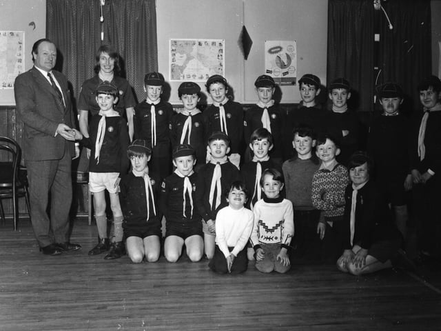A local scout unit handing over a Christmas cheque to Stradreagh Hospital