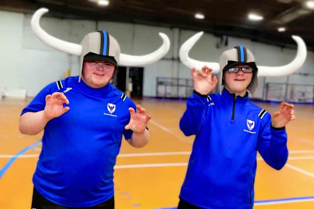 Jack Rogers and Sean McCaul are team players at Oxford Bulls FC. The team, who are made up of players with Down Syndrome, became a household name seven years ago when Ireland legend James McClean answered their appeal for opposition and brought a team to play them at the Foyle Futsal Centre.