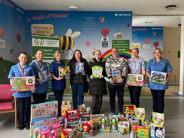 Pictured from left to right are: Staff Nurses Naiomh, Rebecca, and Laura; along with Ryan's grandmother Lorraine; Ryan's mum Julie and dad Victor; Nursing Assistant Shauna and Staff Nurse Raicheal.