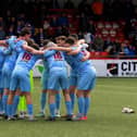 Institute group huddle before the game against Linfield. George Sweeney