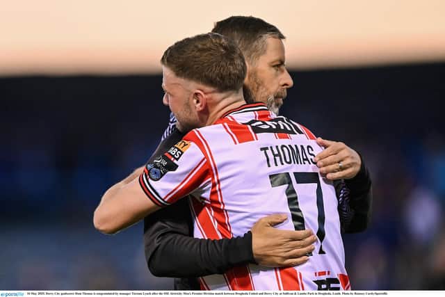 Could Dom Thomas, pictured here being congratulated by manager Tiernan Lynch, be on his way out of Brandywell this summer? Photo by Ramsey Cardy/Sportsfile