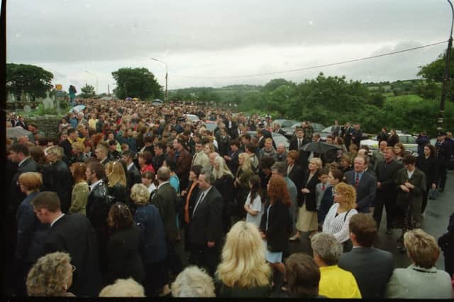 A section of the huge crowds at St Mary's Church, Cockhill, in attendance of the boys' funeral.