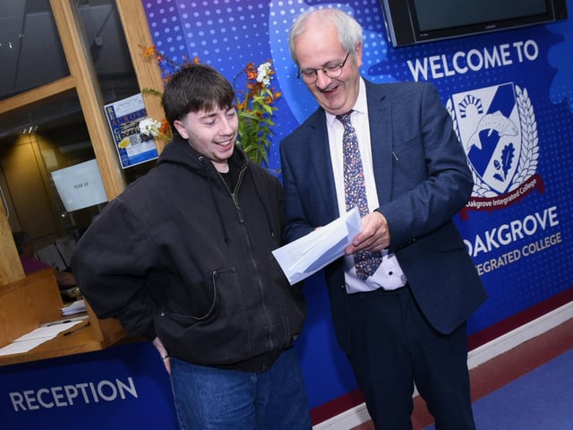 Daire Jackson-McLaughlin checking out his A Level results with Oakgrove College Principal John Harkin