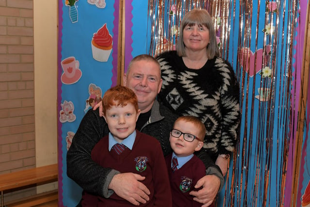 James and Doreen Carlin with Thomas and James at St John’s PS Grandparents Vintage Tea. Photo: George Sweeney