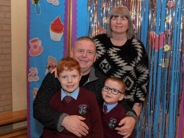 James and Doreen Carlin with Thomas and James at St John’s PS Grandparents Vintage Tea. Photo: George Sweeney