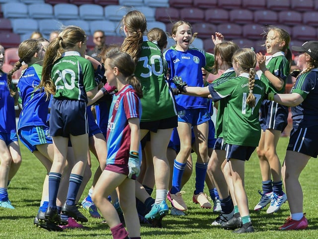 Tower Cup winners Good Shepherd Primary School and Shield winners Sacred Heart Primary School celebrate their victories together. Photo: George Sweeney