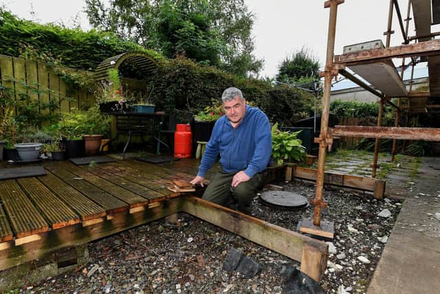 Danny Rafferty pictured at the rear of his property which was built using defective blocks. Photo: George Sweeney
