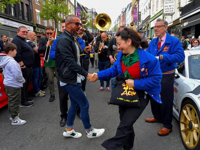 Derry’s own Mickey Doherty jives with a member of the Jive Aces at the super cars and American Muscle cars Bear Run event at Derry’s Shipquay Street on Saturday morning to raise funds for Bumbleance, the Children’s Ambulance Service. Photo: George Sweeney. DER2317GS – 121