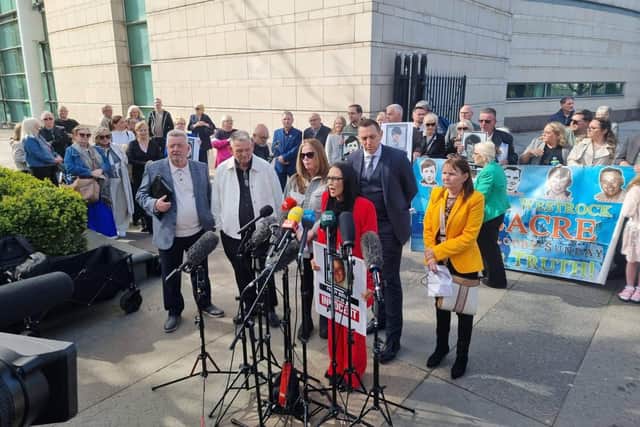 A delegation from the Bloody Sunday Trust, on left, as the Springhill/Westrock families and solicitor Pádraig Ó Muirigh addressed the media outside the Laganside Courthouse last month.
