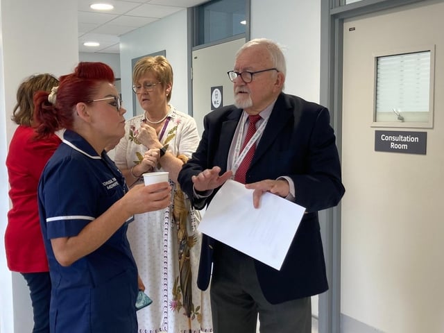 Chair of the Western Trust Board Dr. Tom Frawley in conversation with staff at the official opening of a new antenatal clinic at Altnagelvin.