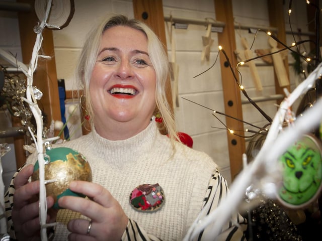 Mary McGrory pictured hard at work on her stall.