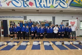 Heart of Foyle volunteers with pupils from St Paul's Primary School in Galliagh.