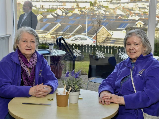 Catherine Moore and Helen McAdams, members of the Long Tower Purple Hearts, pictured the Cloisters Café based in Aras Cholmcille in the grounds of St Columbas Long Tower Church. Photo: George Sweeney