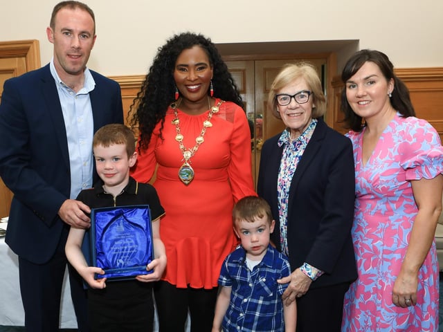 Mayor of Derry City and Strabane District Council, Councillor Lilian Barr, made a presentation to Aidan McCrossan "Families First NI Education Award NI Teacher of the Year 2024" at a reception for Knockavoe School held in the Mayor's Parlour. Included are Aidan's wife Clare, mum Helen and children Finn and Shay. (Photo - Tom Heaney, nwpresspics)