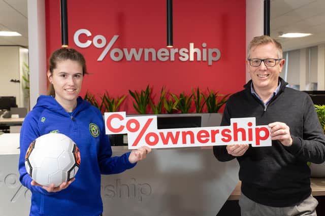 Pictured left to right Naomi Donnan, Senior Ladies player at Sion Swifts Ladies and Mark Graham, Chief Executive at Co-Ownership. Pictured by Ricky Parker Photography.