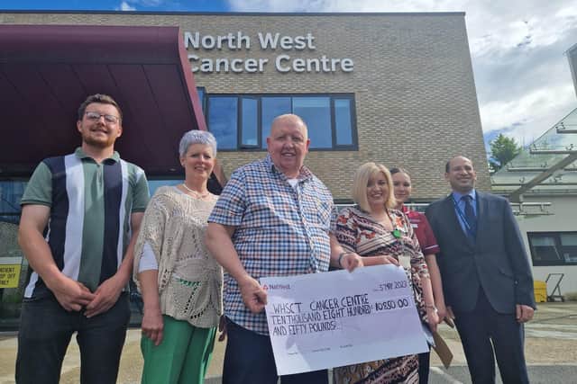 L-R Ben, Pauline and Iain Peilow hand over the cheque to North West Cancer Centre haemotolgy clinical nurse specialist Natalie Martin, NW Cancer Centre General Manager, Cancer Services, Bridget Toorish and Dr Hossam Abdulkhalek, Clinical Lead, North West Cancer Centre.