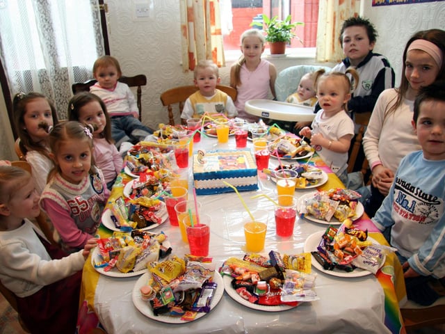 Joshua and his party guests look forward to the party treats! 0011JML : Parties and nights out in March 2006