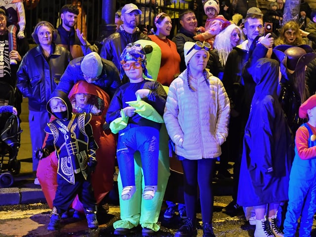 Spectators pictured at the ‘City of the Bones’ Halloween carnival parade on Friday evening. Photo: George Sweeney