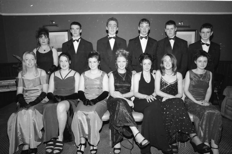 Seated, from left, Julie Doherty, Tracey Cavanagh, Margaret-Anne Doherty, Orlaigh O'Kane, Shauna Cavanagh, Aisling Conlon, and Deirdre Donaghy. Standing, from left, Anita Lafferty, Sean Comiskey, Patrick McGuinness, Brian Lafferty, Peter McCormack and Paul McCarron. Pictured at the Carndonagh Community School formal in January 1998.