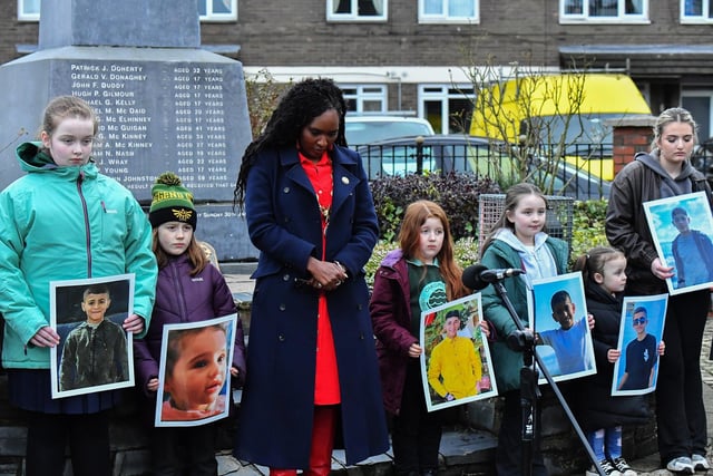 Mayor Lilian Seenoi Barr stands alongside young relatives of those murdered on Bloody Sunday during the one minute silence dedicated to the children of Gaza at the Bloody Sunday monument on Thursday afternoon. Photo: George Sweeney