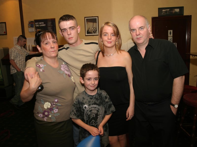 Mariead with mum and dad, and brothers Declan and Joseph
enjoying her 18th party:Derry parties from November 2003