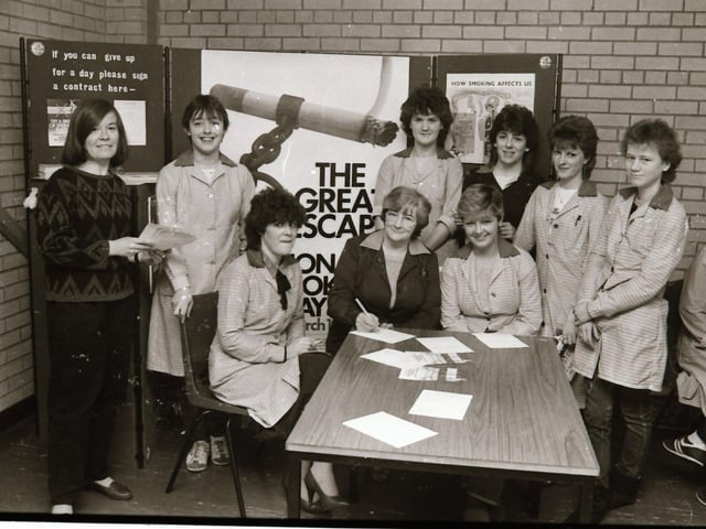 Signing National No Smoking Day pledges at Desmonds, Newbuildings.