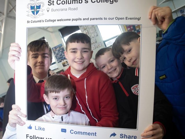Prospective pupils take time out for a Facebook photo at St. Columb's College on Saturday. : .