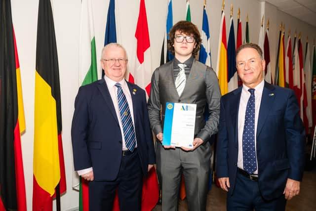 Secondary chool student Jay Curry  receiving his Rotary Youth Leadership Development award from Kenny Fisher, District Governor of Rotary Ireland and Patrick O’Riordan, Head of Public Affairs with the European Parliament in Ireland,  at an event at Europe House in Dublin recently. [Photo: Collette Creative Photography]