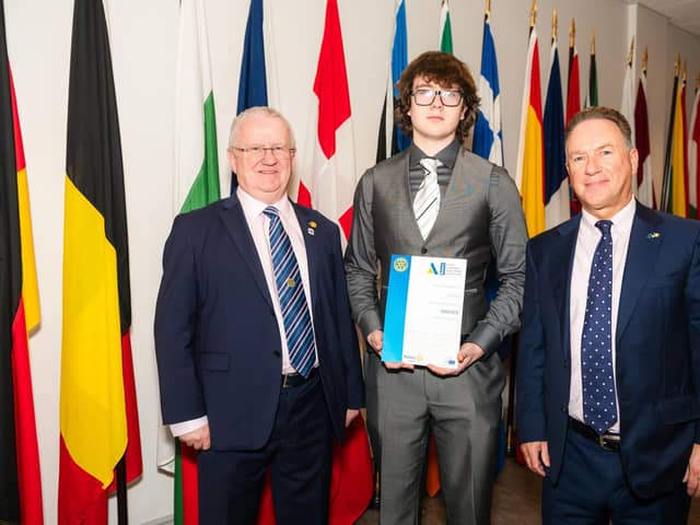 Secondary chool student Jay Curry  receiving his Rotary Youth Leadership Development award from Kenny Fisher, District Governor of Rotary Ireland and Patrick O’Riordan, Head of Public Affairs with the European Parliament in Ireland,  at an event at Europe House in Dublin recently. [Photo: Collette Creative Photography]